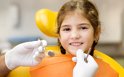 Girl having a dental exam done