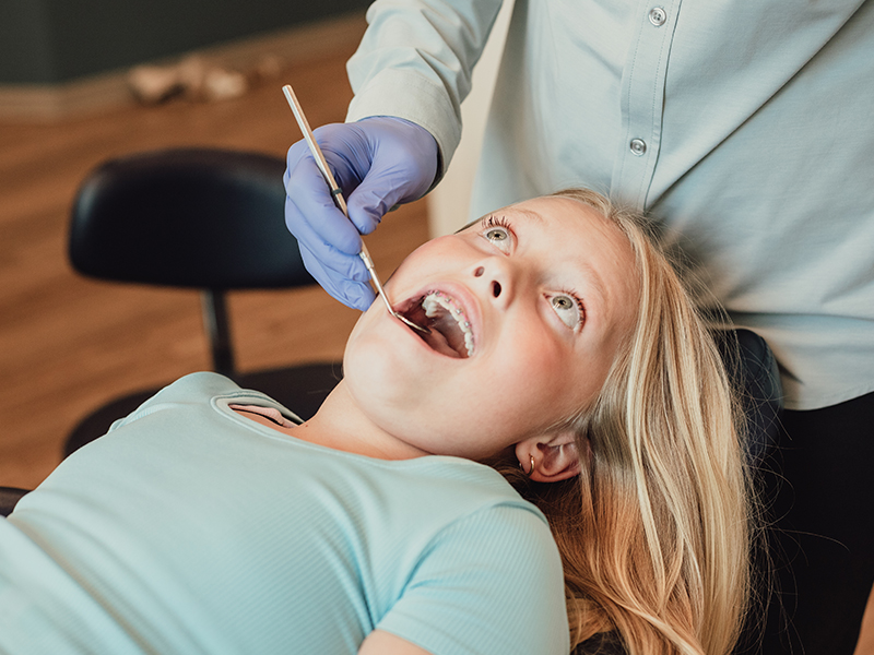 A childs teeth cleaning & exam in Firestone, CO