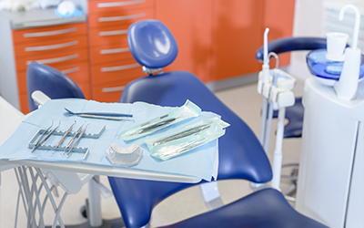 An empty dental chair and dental equipment